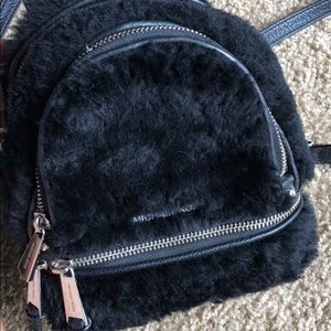 Authentic Michael Kors mini faux leather backpack